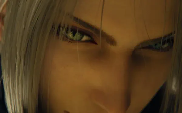 Close-up of Sephiroth's piercing green eyes and silver hair from Final Fantasy VII Revelation, video game 4K Ultra HD PC desktop wallpaper/background.