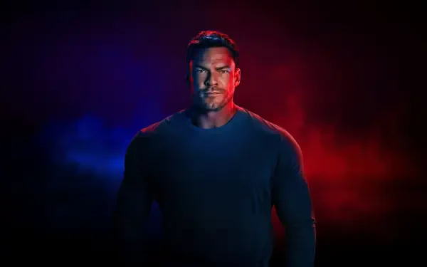 Reacher portrait under red and blue cinematic lighting, intense stare and shadowed muscles against a dark backdrop — 4K Ultra HD PC desktop wallpaper and background.