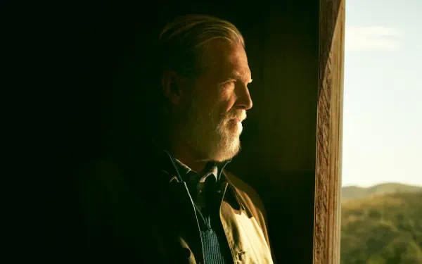 The Old Man — bearded elder in warm window light gazing at sunlit hills; 4K Ultra HD PC desktop wallpaper and background.