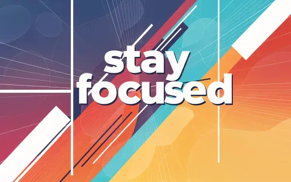 Abstract 4K Ultra HD PC desktop wallpaper featuring bold white stay focused typography quote over colorful geometric shapes and diagonal accents.