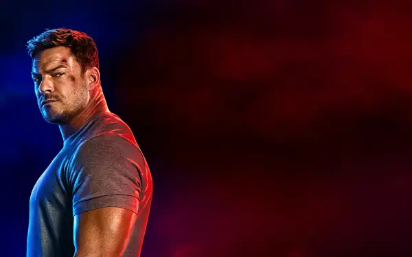 Reacher in dramatic red-blue lighting, muscular profile at left against dark gradient — 4K Ultra HD PC Desktop Wallpaper and Background.