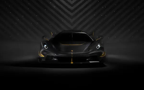 Front view of a Koenigsegg Jesko sports car in dramatic dark lighting, 4K Ultra HD PC desktop wallpaper and background.