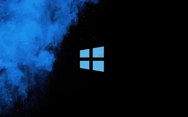 Windows 11 Microsoft 4K Ultra HD PC desktop wallpaper: glowing blue Windows logo centered on black background with swirling blue smoke