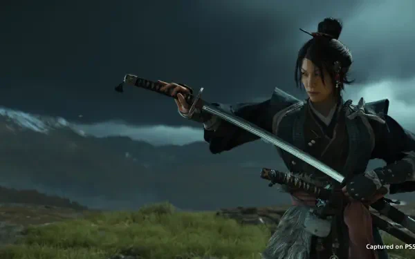 Ghost of Yōtei (Atsu), a samurai warrior in dark armor brandishing a katana on a windswept plain beneath stormy clouds — 4K Ultra HD PC desktop wallpaper.