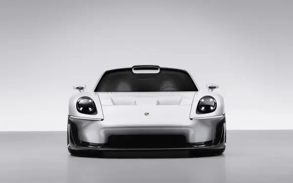 Front view of a white Porsche Mission S sports car, featured in a 5K Ultra HD PC desktop wallpaper and background.