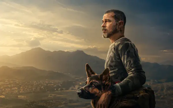 Heart of the Beast 4K Ultra HD PC desktop wallpaper featuring a man with his dog overlooking a mountain valley at sunset.