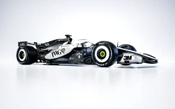 Cadillac MAC-26 F1 race car in a sleek side view, featured as an 8K Ultra HD desktop wallpaper and background.