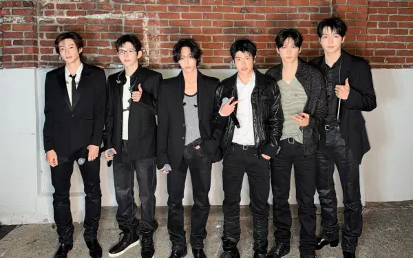 RIIZE boy band group photo in black outfits against a brick wall, featured in Insomnia 4K Ultra HD PC desktop wallpaper background.