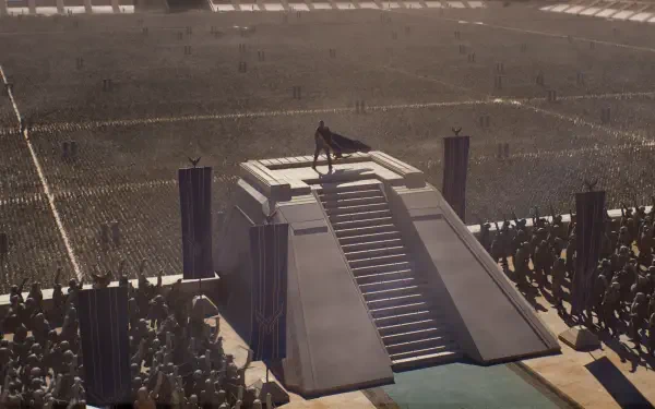 Dune: Part Three 2K Quad HD PC desktop wallpaper showing a lone figure atop a monumental stairway above a vast arena.