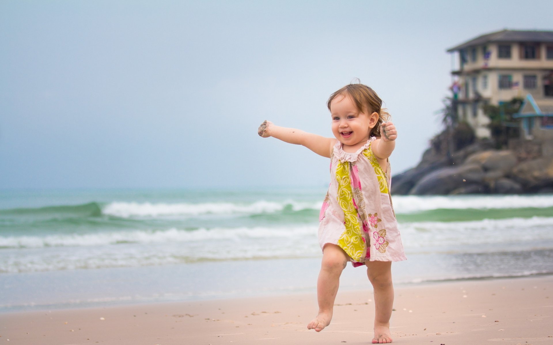 Baby Girl Walking on the Beach.