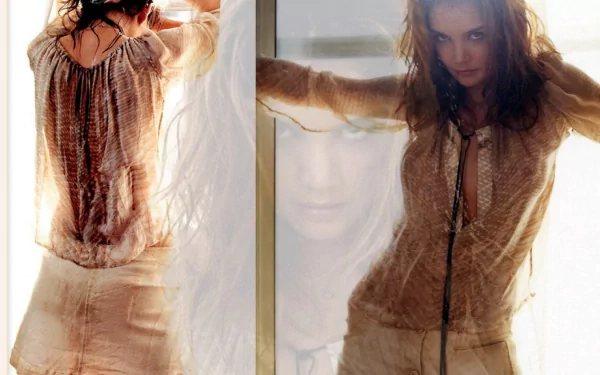 HD PC desktop wallpaper featuring celebrity Katie Holmes in a soft, ethereal pose with layered, semi-transparent images showcasing her contemplative expression.