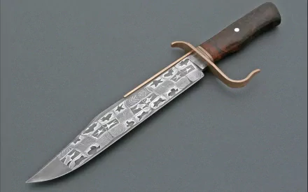 A beautifully crafted knife with intricate designs on the blade and a wooden handle, featured prominently as an HD PC desktop wallpaper and background.