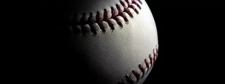 Close-up HD desktop wallpaper of a white baseball with red stitching, highlighting its texture and detail against a dark background in a sports-themed image.