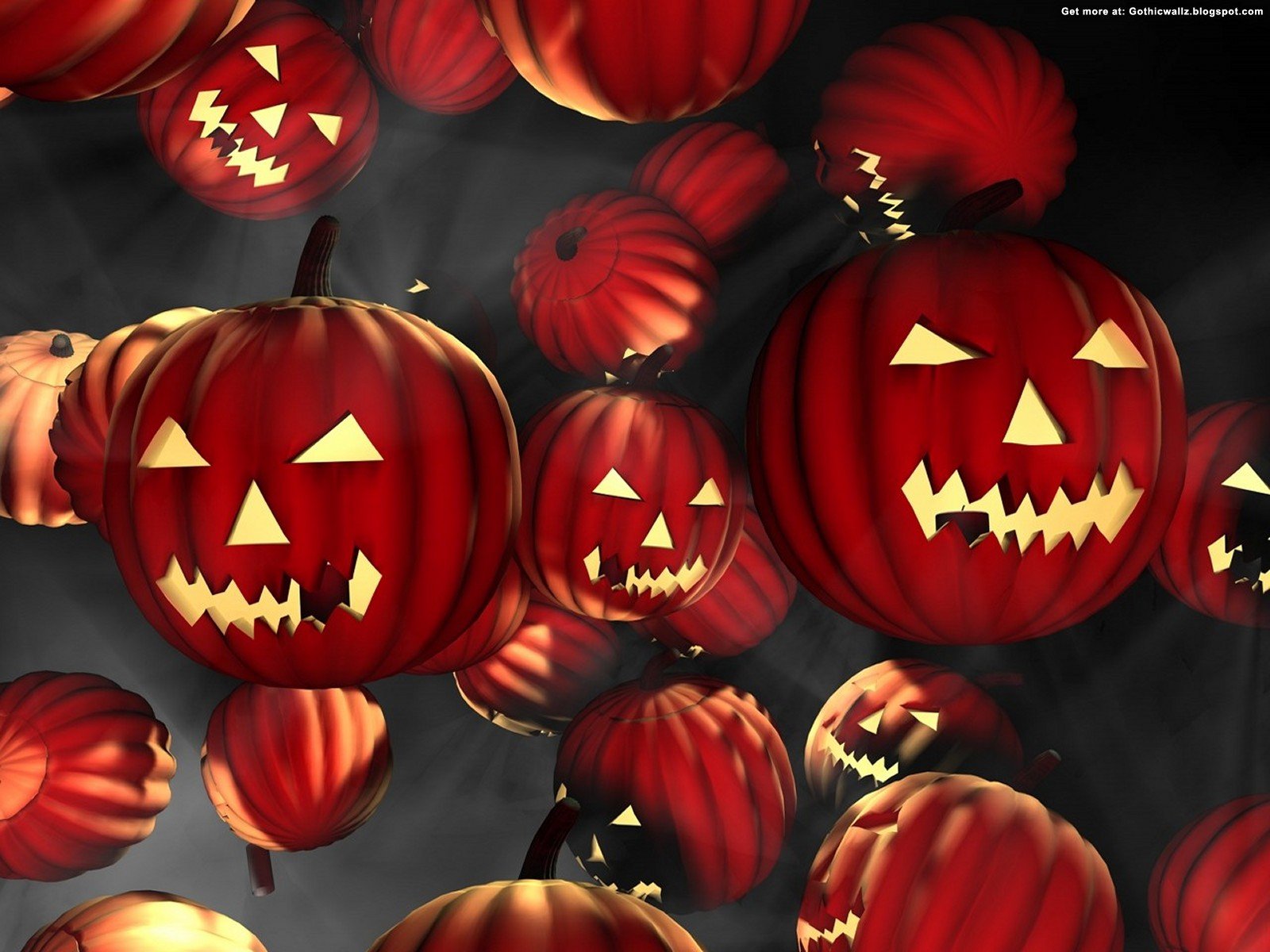 HD PC desktop wallpaper featuring glowing jack-o'-lanterns floating against a dark background, capturing a spooky Halloween holiday atmosphere.