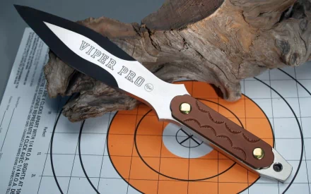 A sleek Viper Pro knife rests on a textured wooden surface, featured prominently against a target design, creating a striking HD desktop wallpaper background.
