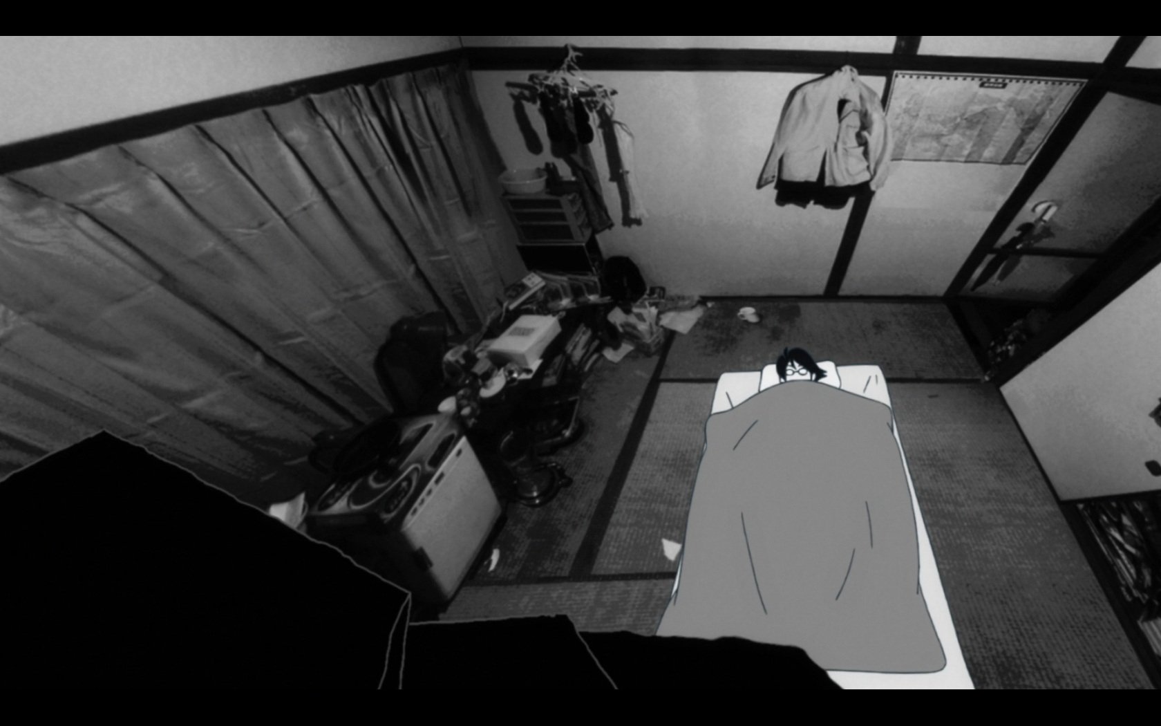 Black and white HD anime desktop wallpaper from The Tatami Galaxy, depicting a character lying in bed in a compact, detailed room with various objects around.