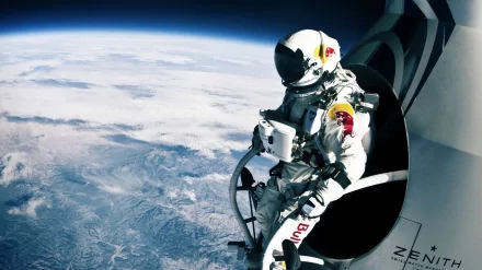 HD desktop wallpaper featuring Felix Baumgartner in his Red Bull spacesuit, captured during his high-altitude jump with Earth’s curvature in the background.