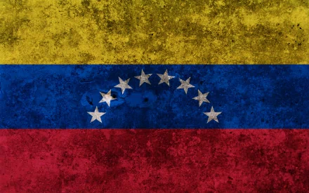 HD PC desktop wallpaper featuring the Venezuelan flag with a textured, grunge-style background in yellow, blue, and red with eight white stars arranged in an arc.