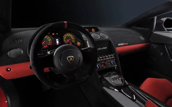 HD PC desktop wallpaper showing the luxurious interior and dashboard of a Lamborghini Gallardo vehicle with black and red accents.