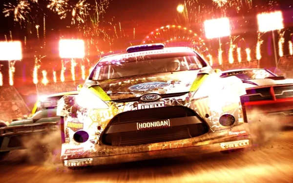 HD PC desktop wallpaper featuring a dynamic rally car racing scene from the video game DiRT 3, with vibrant fireworks lighting up the background.
