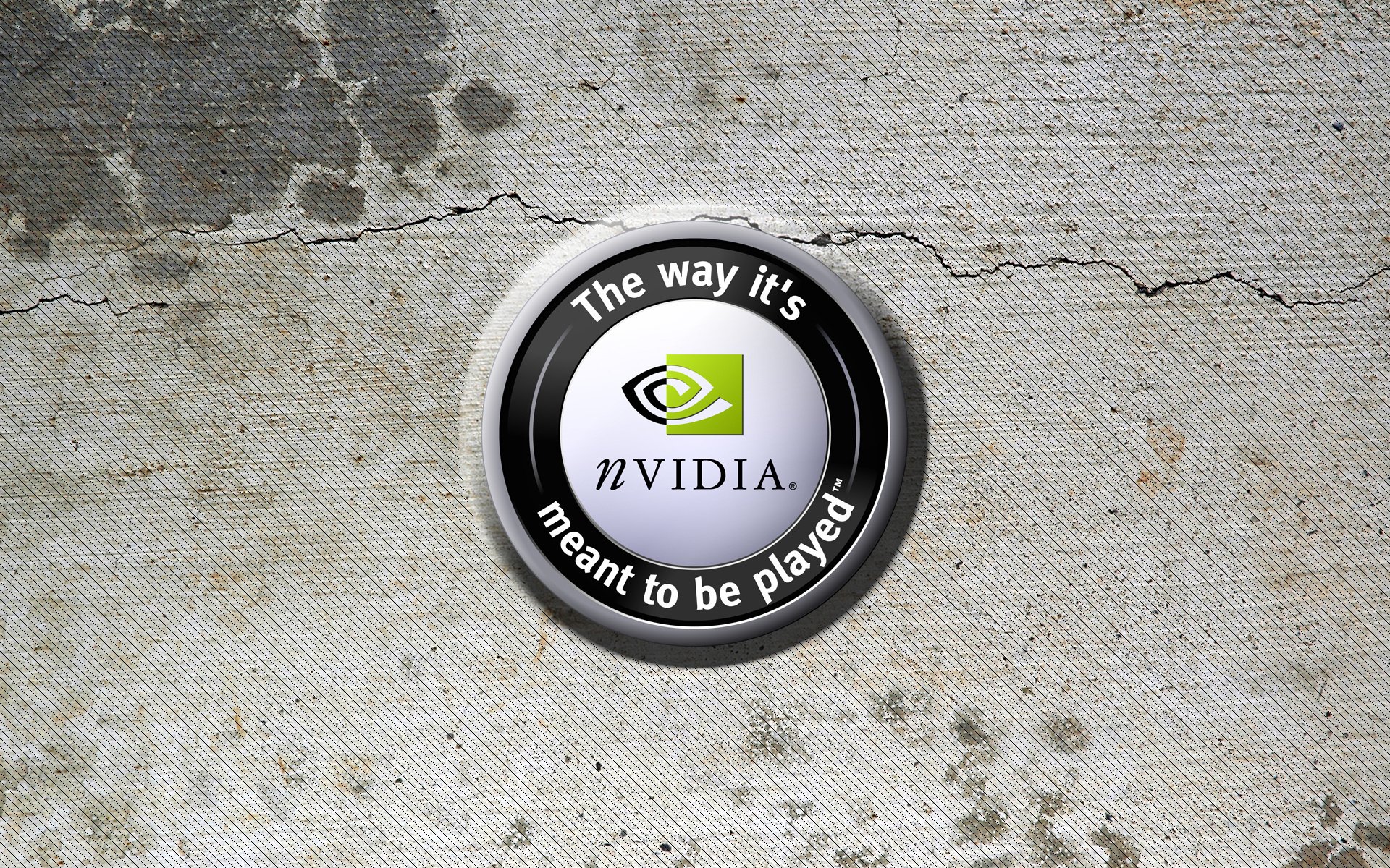 HD PC desktop wallpaper showing an Nvidia logo badge and slogan The way it's meant to be played on a cracked, textured concrete background (technology / Nvidia).