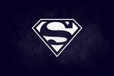 A striking HD wallpaper featuring the iconic Superman logo against a dark background, embodying the essence of comic book heroism and power.
