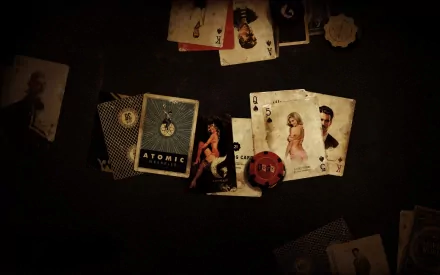 A dark, atmospheric HD wallpaper featuring playing cards and chips inspired by Fallout: New Vegas, capturing the game's unique vintage aesthetic.