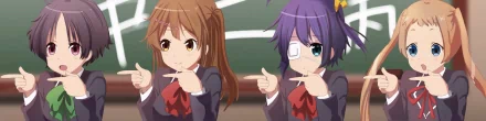 A vibrant HD desktop wallpaper featuring Kumin Tsuyuri and Rikka Takanashi from Love, Chunibyo & Other Delusions. The characters playfully pose, capturing the essence of their friendship.