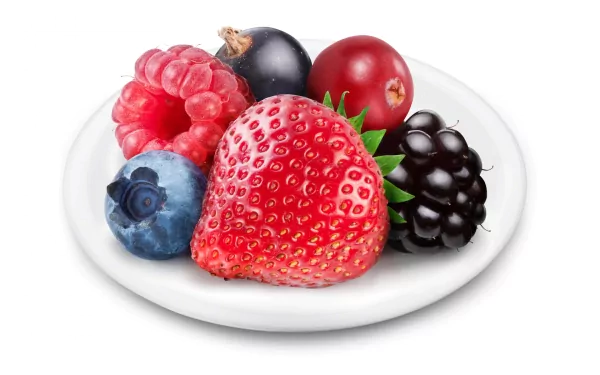 HD PC desktop wallpaper featuring a close-up of various fresh berries, including strawberry, raspberry, blueberry, blackberry, and currant on a white plate.