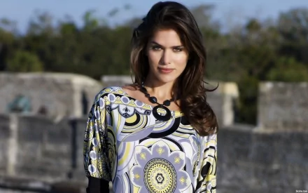HD PC desktop wallpaper featuring a woman with dark hair wearing a patterned top, set against an outdoor backdrop, tagged with Anahi Gonzales.
