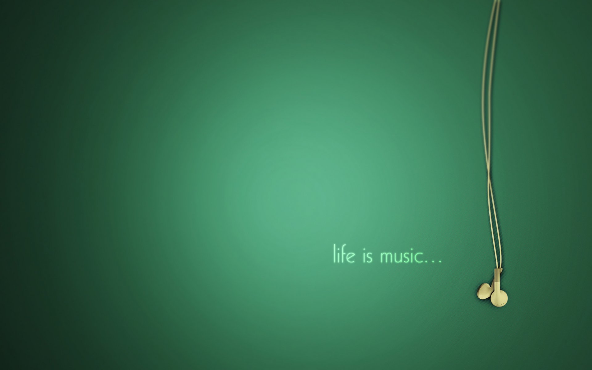 HD PC desktop wallpaper featuring a pair of white headphones hanging against a green background with the phrase life is music... emphasizing a music theme.