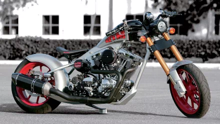 HD desktop wallpaper featuring a custom West Coast Choppers motorcycle with a sleek silver and red design, showcased against a blurred urban background.