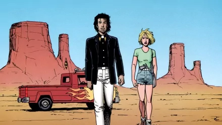 Comic-style HD PC desktop wallpaper: a preacher in a black coat and a blonde woman walk across a desert with sandstone buttes; a red pickup with flame decals sits under a clear blue sky.