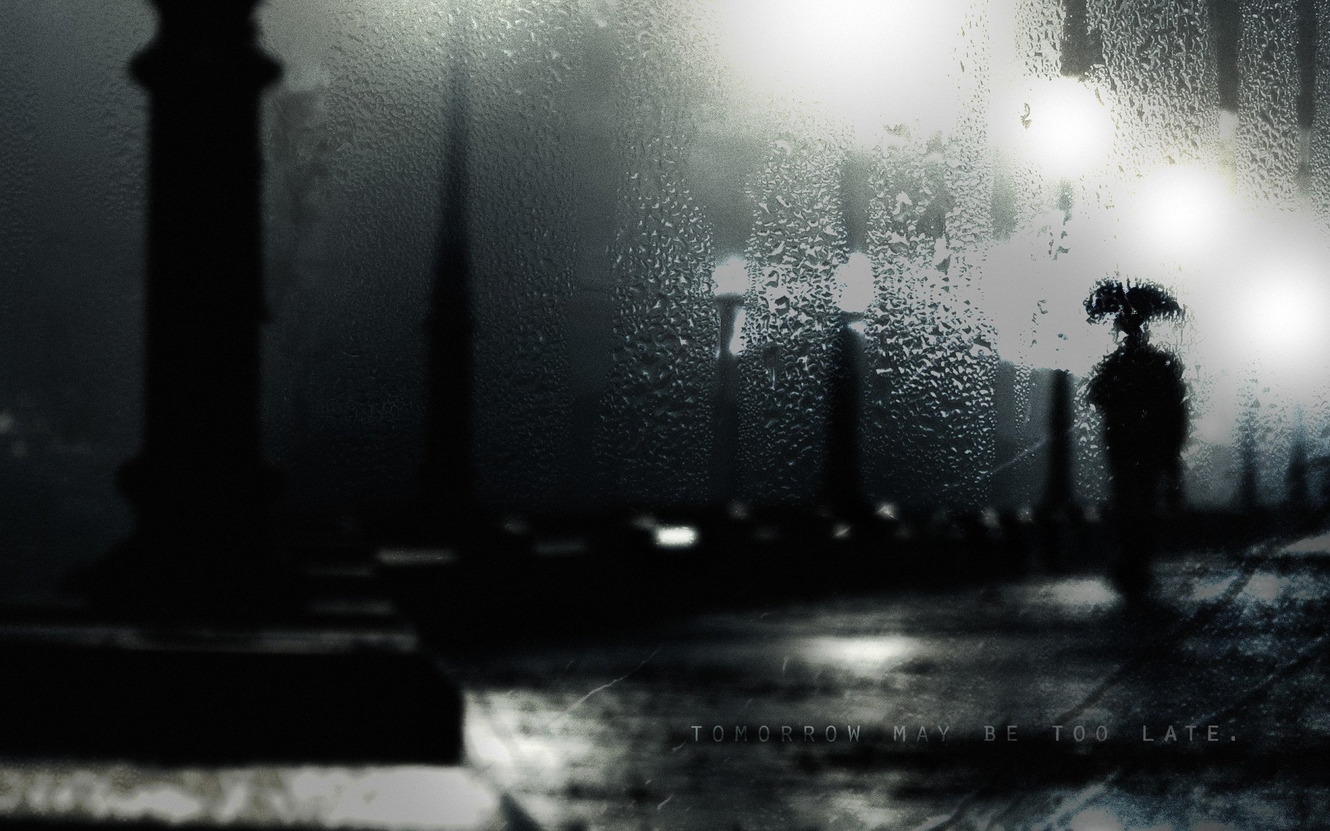 A moody HD desktop wallpaper featuring a figure with an umbrella walking in the rain, illuminated by streetlights through a foggy window.