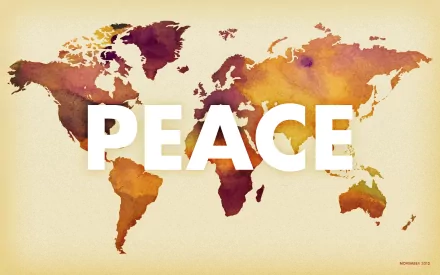 A colorful world map background features the word PEACE prominently displayed, blending vibrant hues to promote a message of harmony. High-definition desktop wallpaper.
