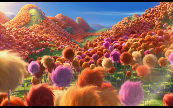 4K Ultra HD movie wallpaper of The Lorax featuring a vibrant landscape filled with colorful Truffula trees under a bright blue sky.