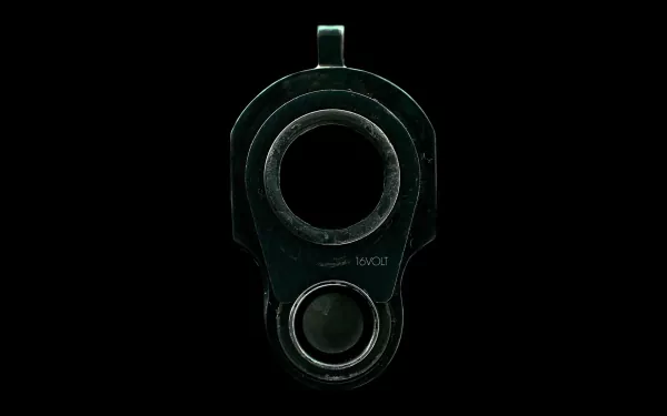 A close-up view of a pistol's mechanism, showcasing intricate details against a black background, designed as a striking HD desktop wallpaper and background.