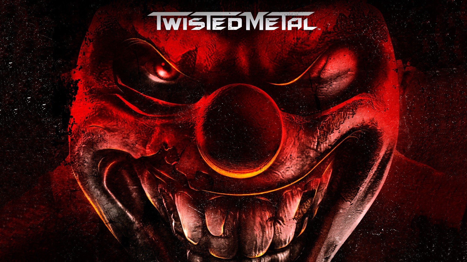 HD desktop wallpaper featuring a menacing clown face from the video game Twisted Metal, with bold colors and intense expressions, enhancing the game's dark, chaotic theme.