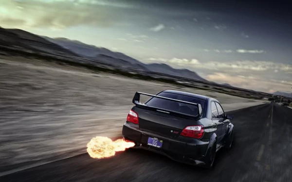 A black Subaru Impreza speeding on a desert road with flames shooting from its exhaust, captured in a dynamic 4K Ultra HD desktop wallpaper.
