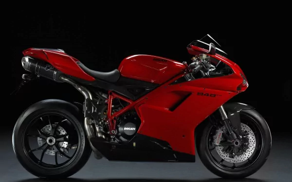 Sleek red Ducati 848 motorcycle showcased against a dark background, captured in high-definition as a PC desktop wallpaper and background.