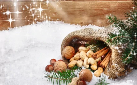 A burlap sack overflows with assorted nuts and cinnamon sticks, nestled in snow, complemented by festive greenery, creating a warm holiday Christmas scene.