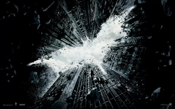 HD PC desktop wallpaper of the Batman logo formed by shattered glass with dark cityscape, inspired by The Dark Knight Rises movie.