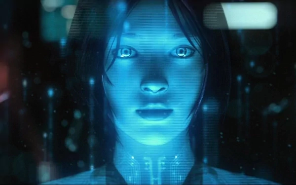 HD desktop wallpaper of Cortana from the video game Halo 4. The detailed image features Cortana's blue holographic face against a dark, tech-inspired background.