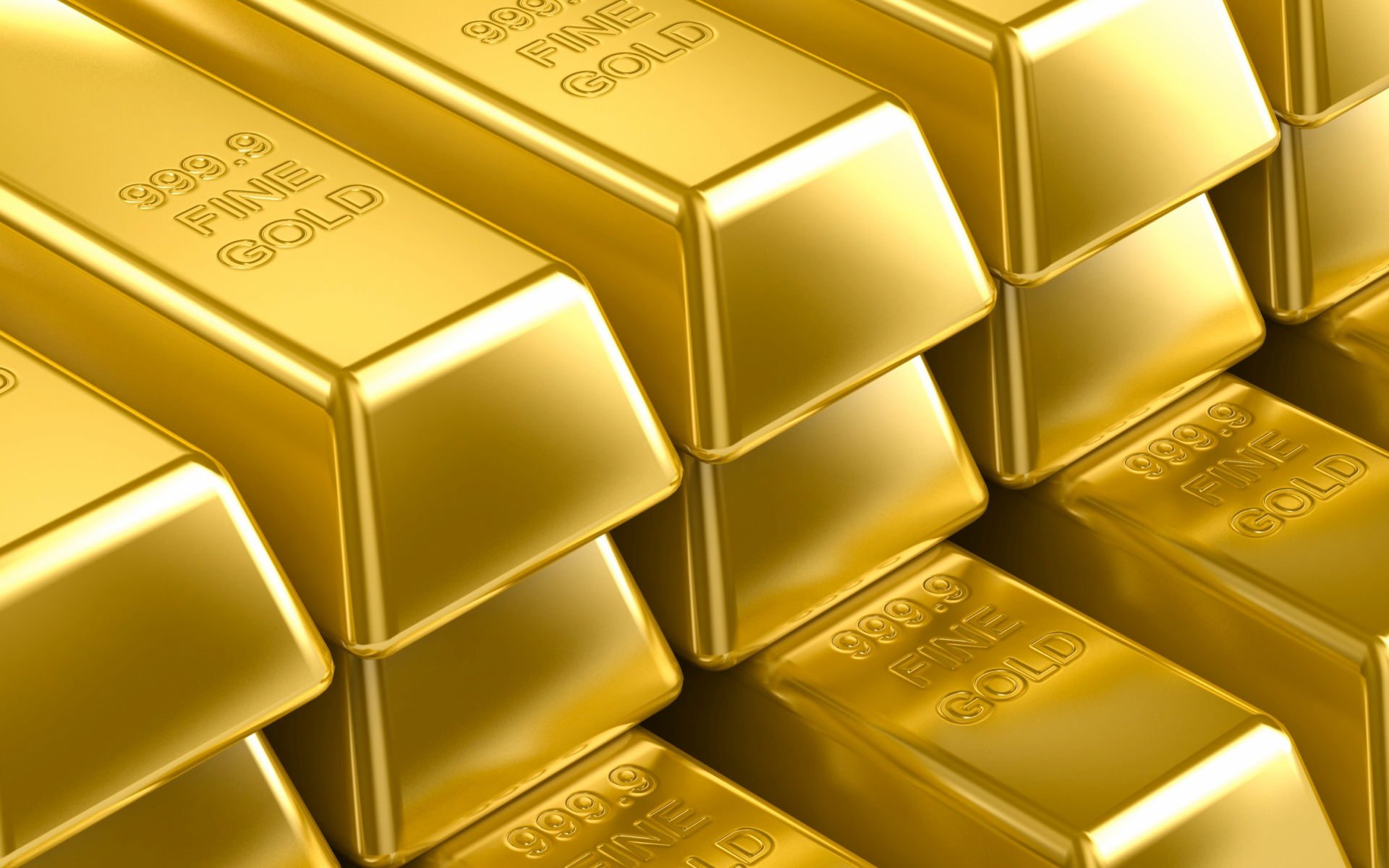 HD photography of stacked shiny gold bars in close-up, a gold-themed PC desktop wallpaper and background.