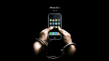 A pair of hands in handcuffs holding an Apple iPhone 3G(S) against a black background, highlighting technology and control in an HD desktop wallpaper.