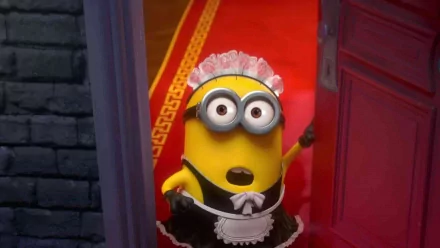 HD PC desktop wallpaper featuring a Minion dressed as a maid from the movie Despicable Me 2, standing in a doorway with a surprised expression.