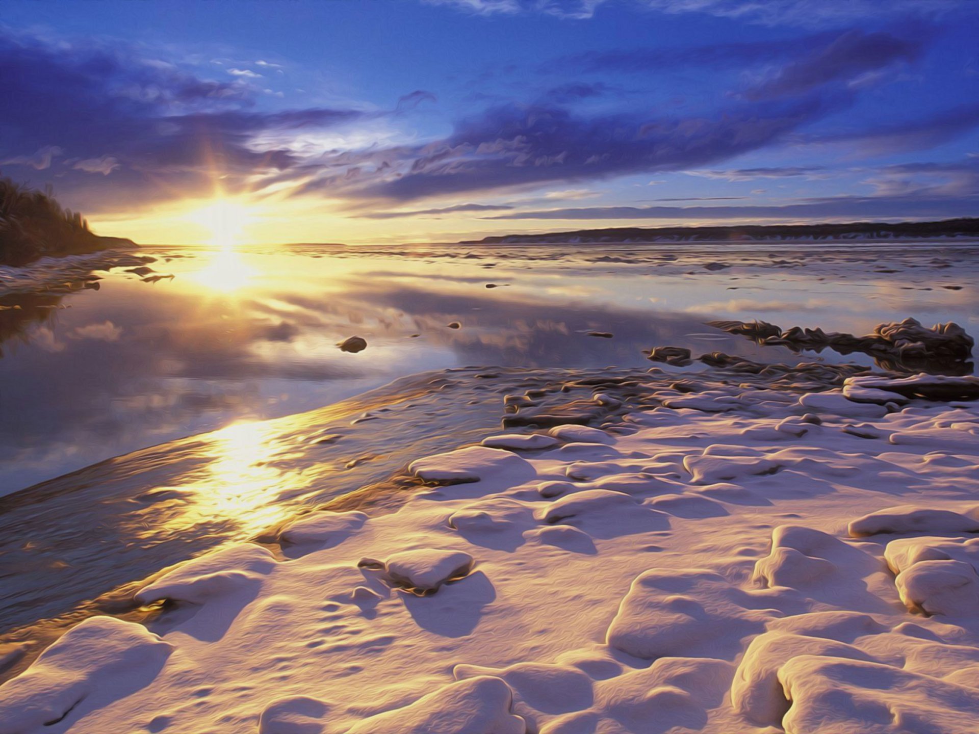 HD desktop wallpaper featuring a serene winter shoreline with snow-covered rocks and a vibrant sunset reflecting on calm water under a colorful sky.