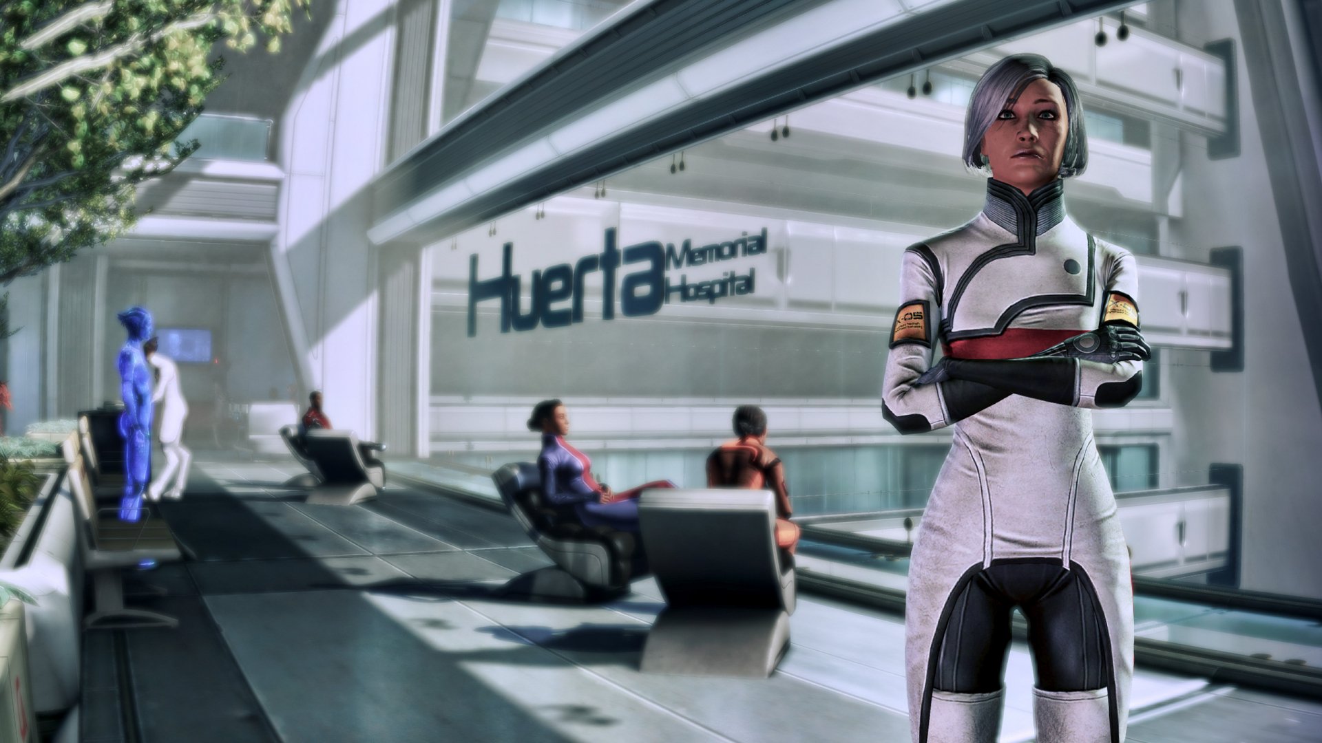 HD PC desktop wallpaper from the video game Mass Effect 3, featuring a character standing confidently inside Huerta Memorial Hospital with others seated in the background.