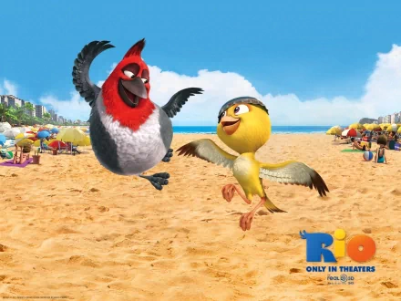 HD wallpaper of animated birds from the movie Rio, joyful on a sunny beach, with the film's logo visible.
