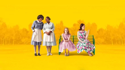 HD wallpaper featuring Octavia Spencer, Emma Stone, and Bryce Dallas Howard from The Help against a vibrant yellow background.